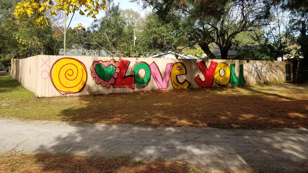 "Love you" was painted over graffiti at local park